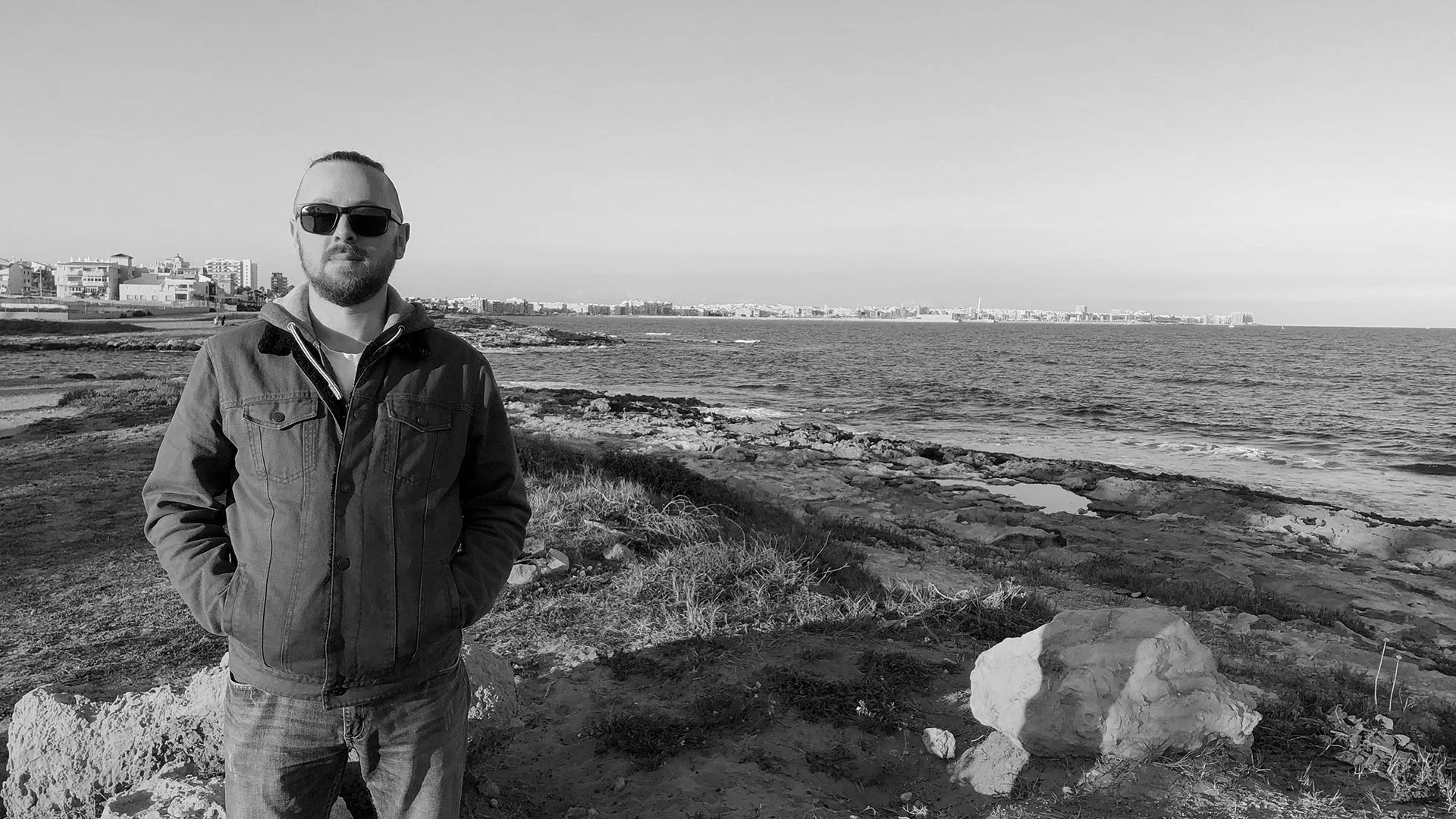 Ryan by the sea at Punta Prima, Spain